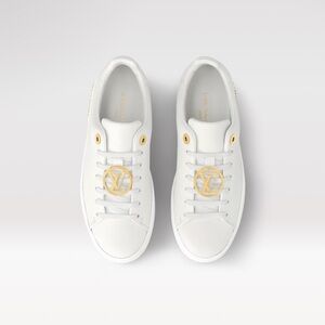 White Sneakers with Gold Accents